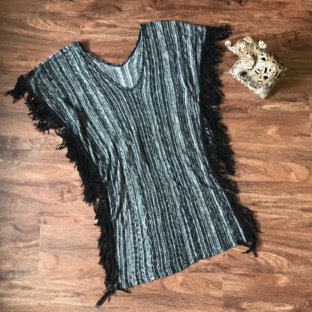 Gray poncho.